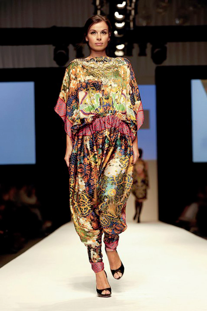 Model wearing textile print of Simurgh bird inspired by Persian mythology and Bukhara tilework.